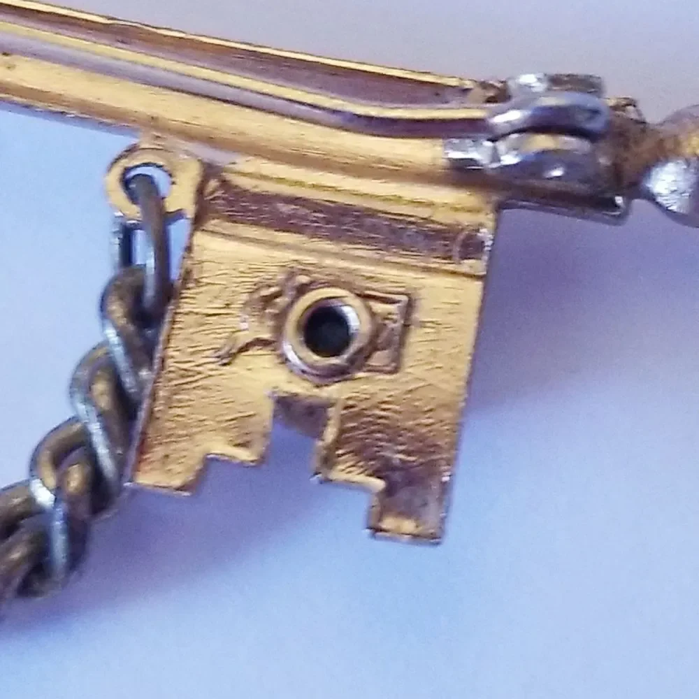 Vintage Coro Pegasus rhinestone chain key brooch